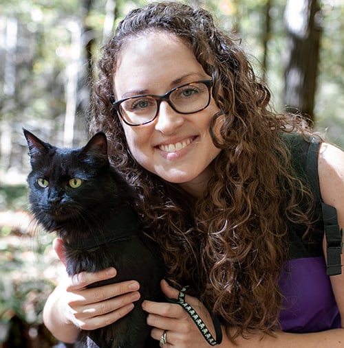 Emily Hall Headshot with black cat