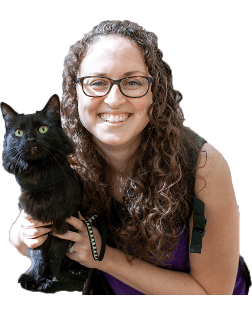 woman holding black cat